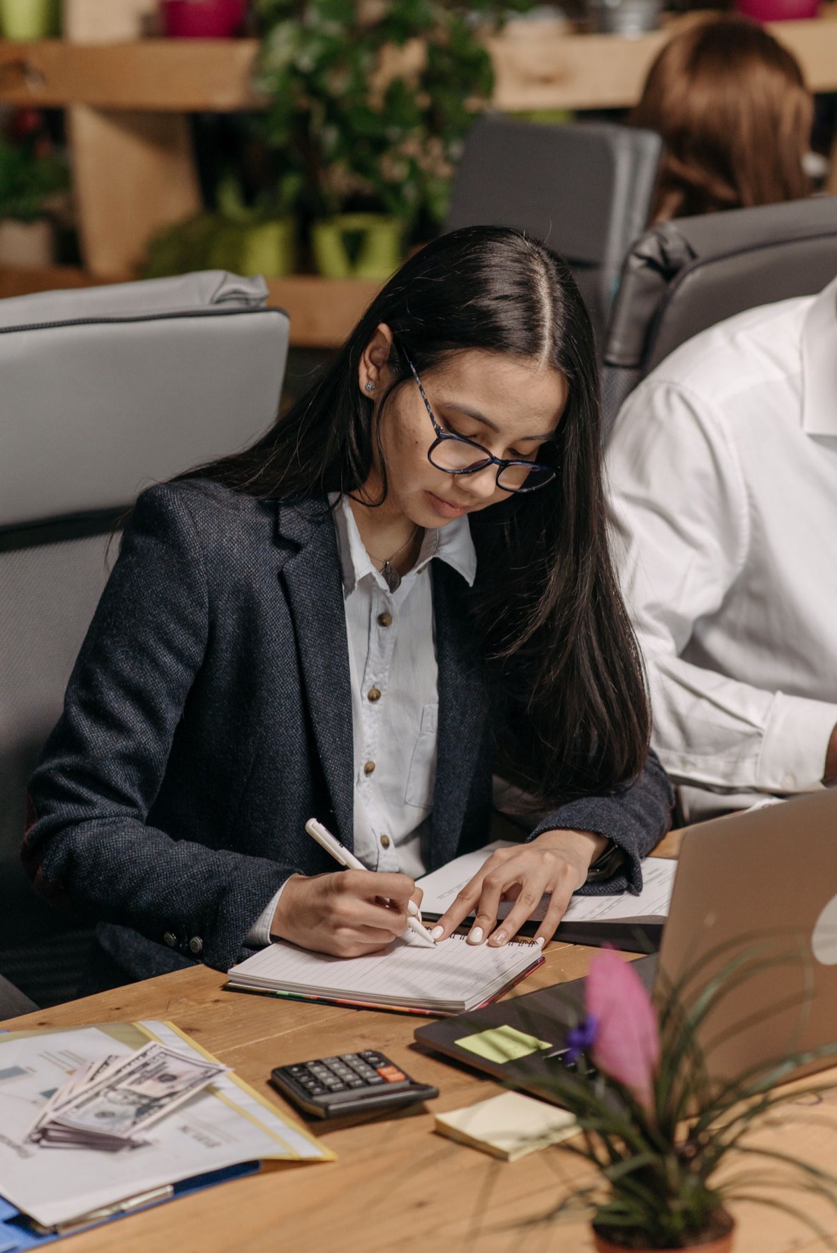 Administrative assistant working at an office desk