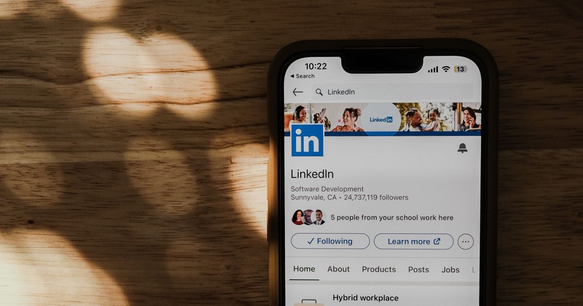 LinkedIn app open on a phone showing a company page with a Jobs tab