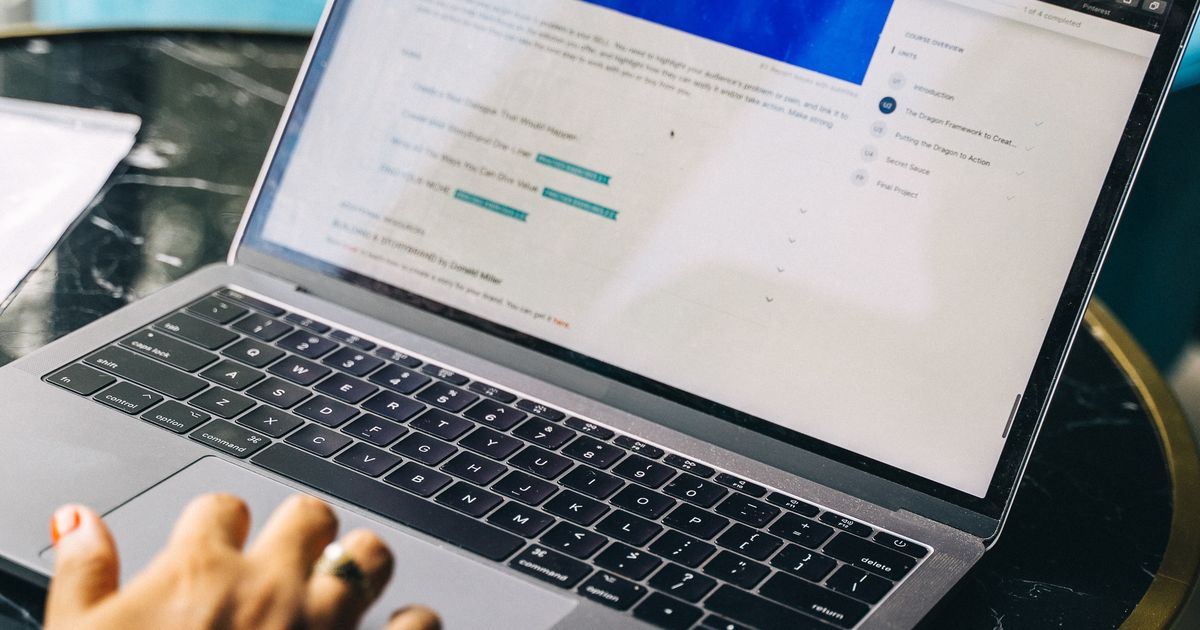 Person editing their LinkedIn About summary on a laptop